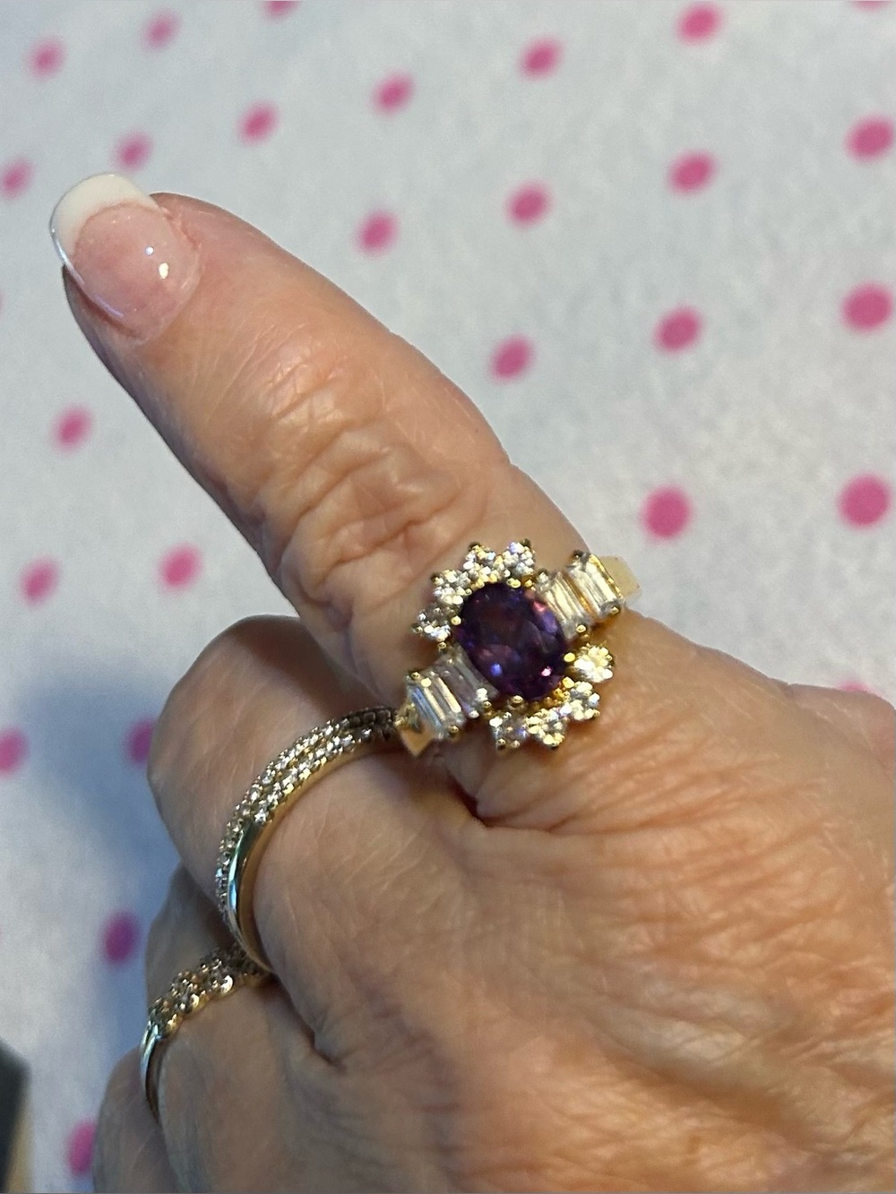 Gold Ring with Purple Center Stone and Clear Accents